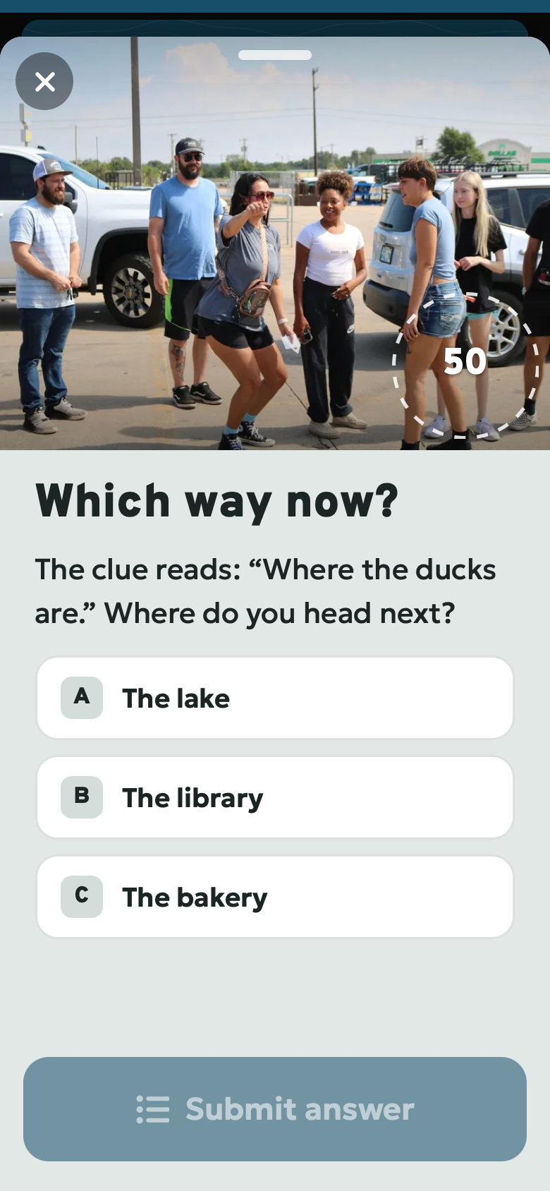 Pick one: Which way now?. The clue reads: “Where the ducks are.” Where do you head next? Choices: The lake, The library, The bakery. Poster preview of the Passport challenge screen.